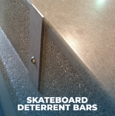 Set of four stainless-steel skateboard deterrent bars with tamper-resistant mounting screws